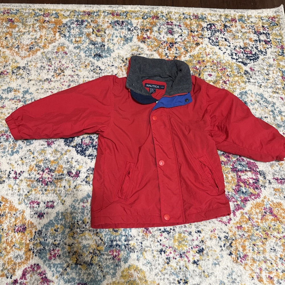 Boy's Used nautical Size 6 Large Winter Jacket. Front zip With Buttons